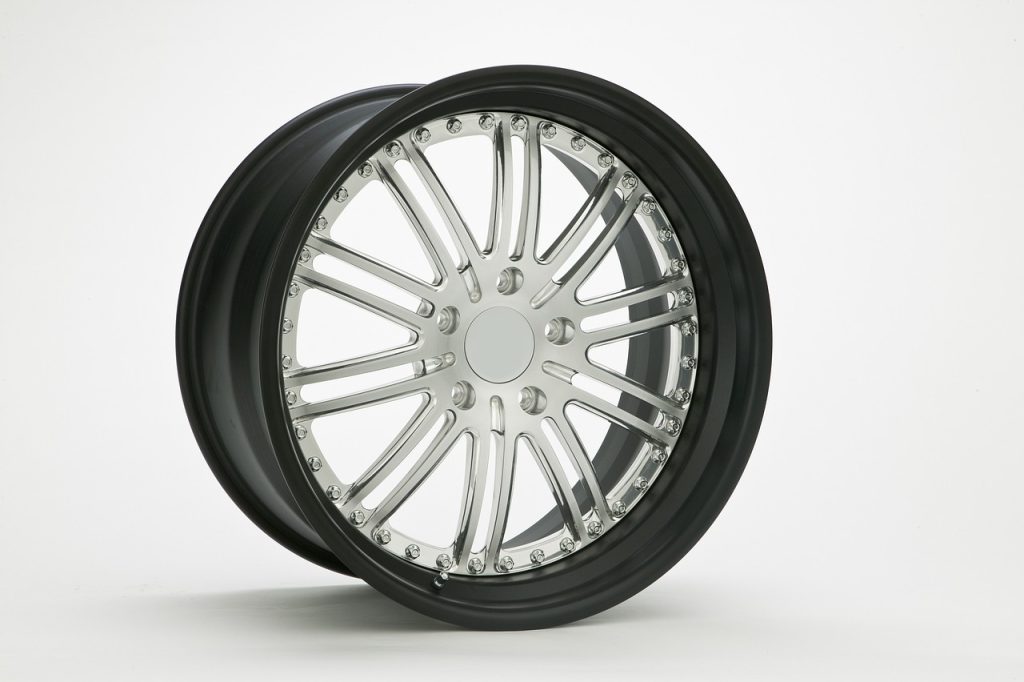 Custom automotive alloy wheel representing Automotive machine shop financing, vehicle painting equipment financing, automotive diagnostic equipment financing, and heavy truck service financing for automotive repair and specialty service businesses.